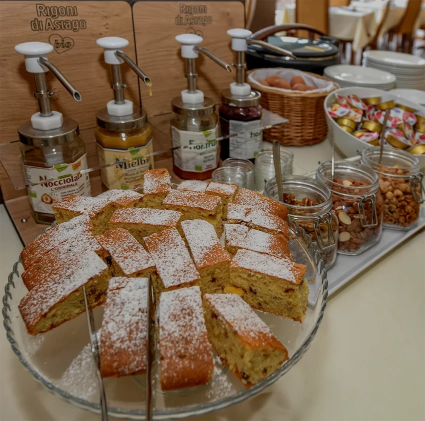 Homemade cake with powdered sugar at breakfast buffet on Lake Garda